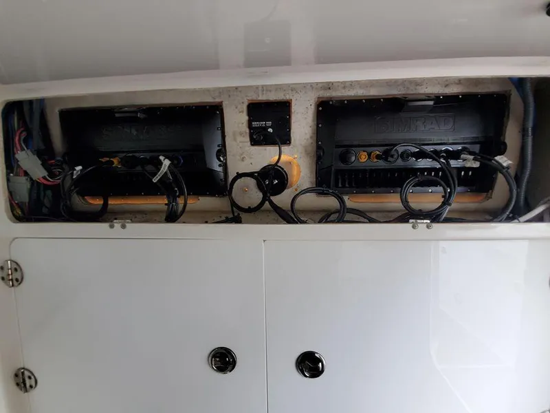 Slide: The Image of Electrical panel of a 2008 Everglades 350 CC boat with wiring and components. - 31