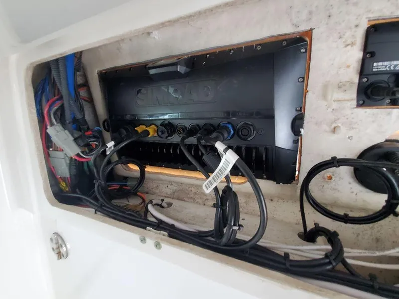 Slide: The Image of 2008 Everglades 350 CC boat wiring and electronics compartment. - 33