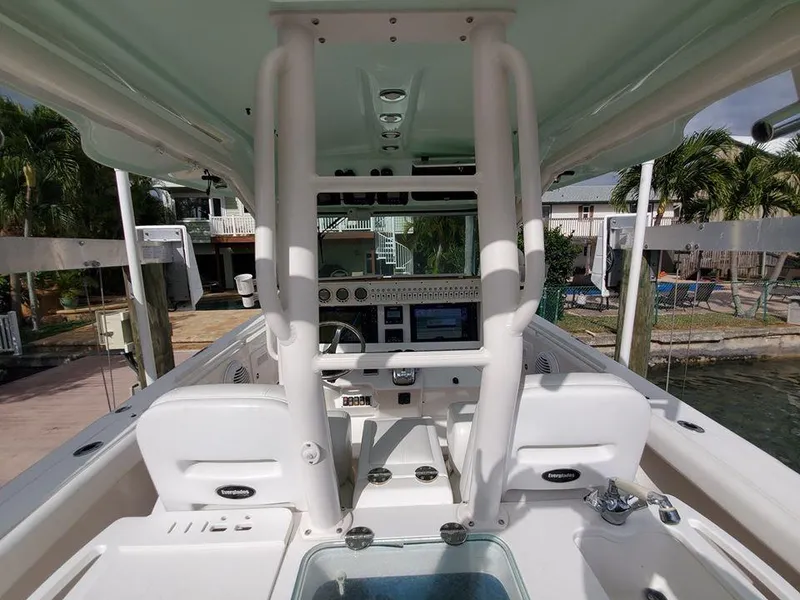 Slide: The Image of 2008 Everglades 350 CC boat cockpit with helm station and controls. - 40