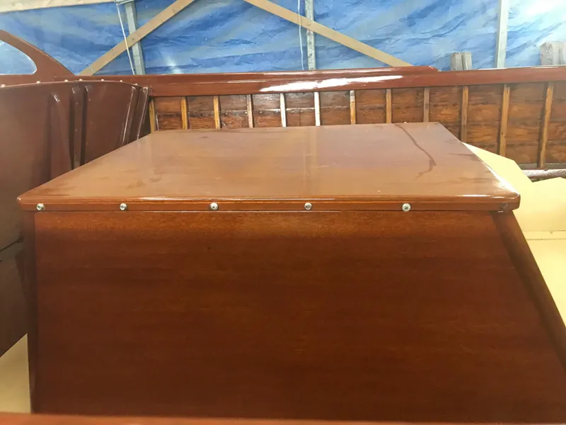 Slide: The Image of 1957 Lyman Islander boat with polished wooden deck and interior. - 16