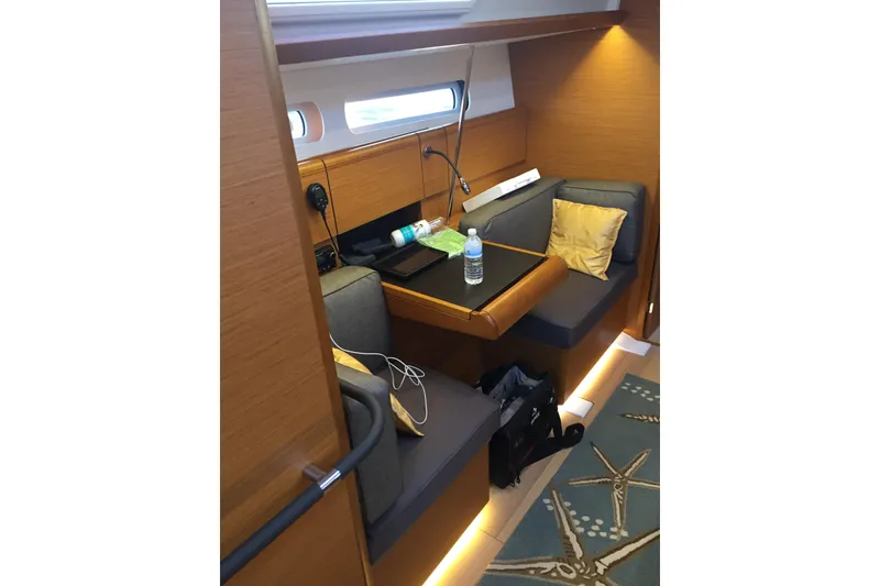 Slide: The Image of Interior of 2017 Jeanneau Sun Odyssey 419 yacht with cozy seating and modern decor. - 10