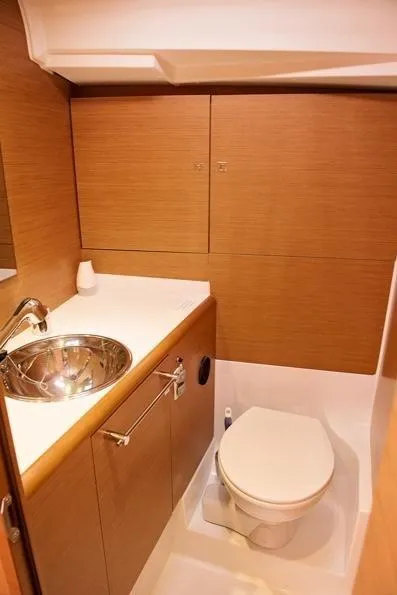 Slide: The Image of Interior view of Jeanneau Sun Odyssey 419 yacht bathroom, 2017 model. - 8