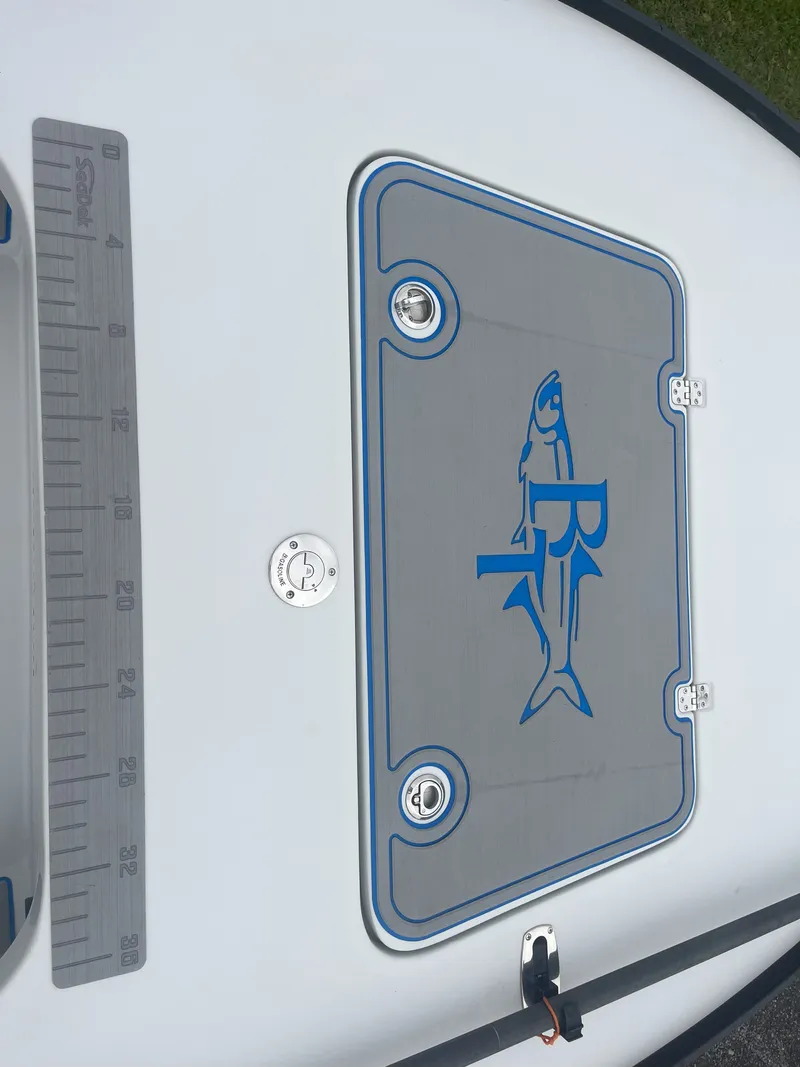 Slide: The Image of 2021 Key West 219 FS boat docked on a sunny day. - 3