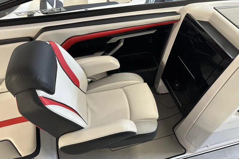 Slide: The Image of 2020 Yamaha Boats 242X interior with sleek, modern seating and red accents. - 4