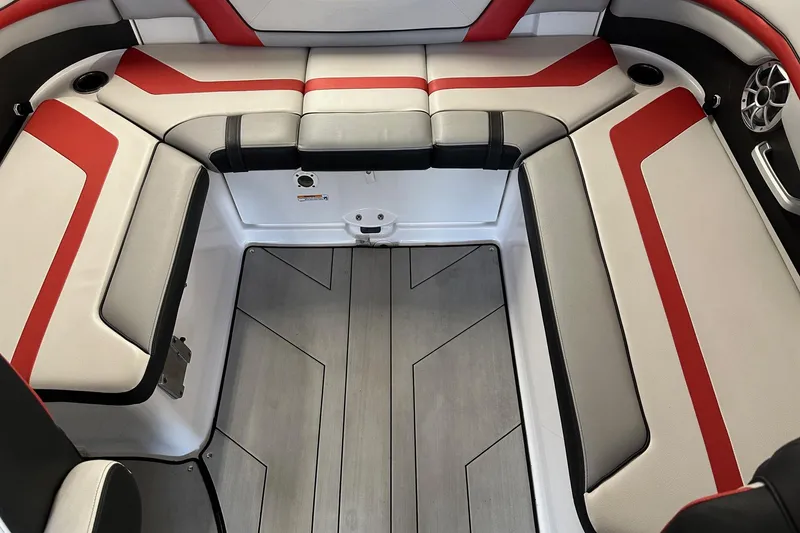 Slide: The Image of 2020 Yamaha Boats 242X interior with red and white seating, modern design. - 7