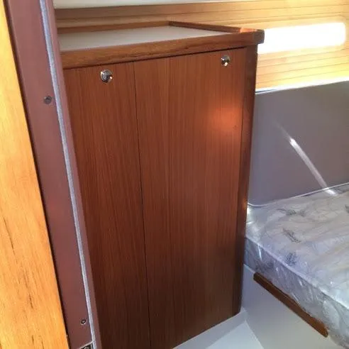Slide: The Image of Interior of 2026 Catalina 426 yacht with wooden cabinetry and bed. - 29