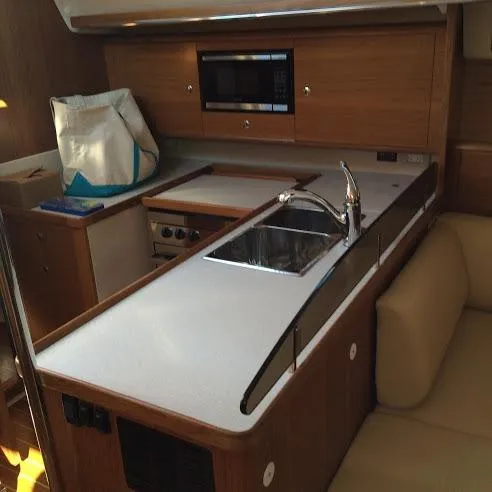 Slide: The Image of Modern kitchen in 2026 Catalina 426 yacht with sink, stove, and microwave. - 30