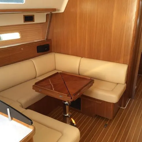 Slide: The Image of Luxurious interior of 2026 Catalina 426 yacht with wooden finish and beige seating. - 31