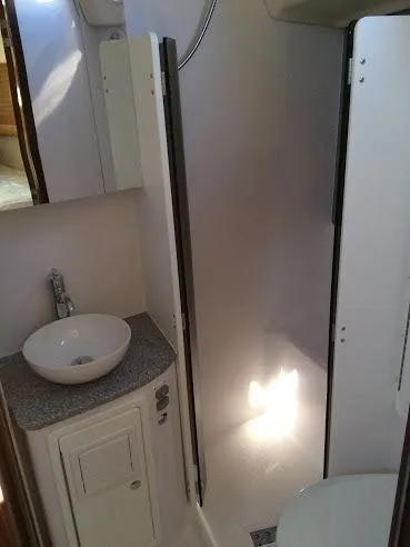 Slide: The Image of Compact bathroom in 2026 Catalina 426 yacht with sink and shower. - 34