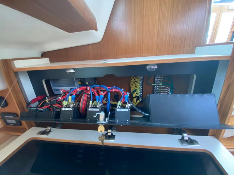 Slide: The Image of Electrical panel inside a 2026 Catalina 426 boat, showcasing wiring and components. - 42