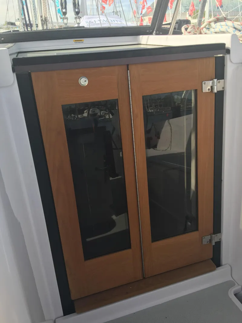 Slide: The Image of Wooden cabin doors on a 2026 Catalina 426 sailboat. - 46