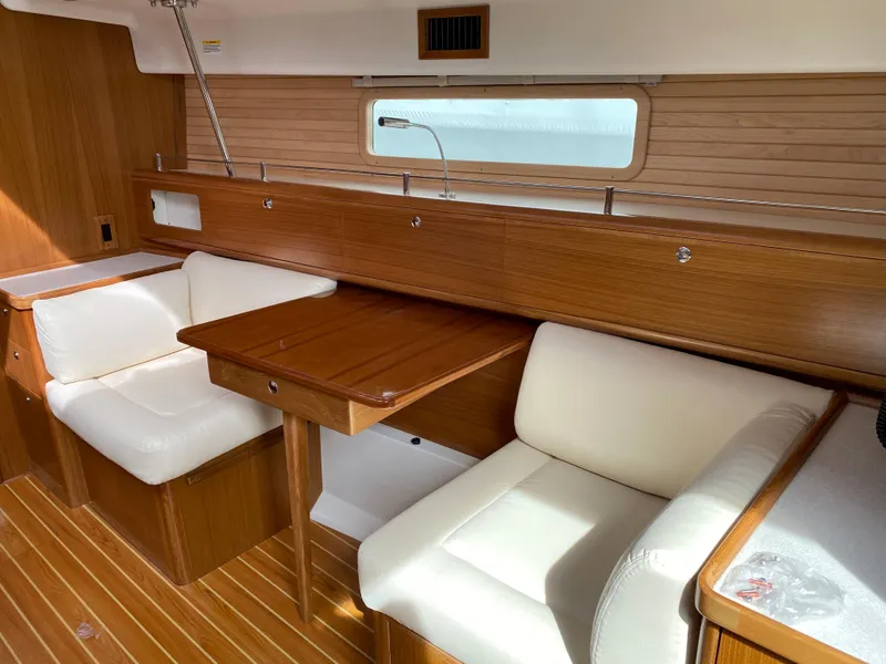 Slide: The Image of Luxurious interior of 2026 Catalina 426 yacht with wooden finish and white seating. - 7