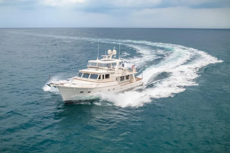 Slide: The Image of Luxury Fleming 65 yacht cruising on open sea, 2027 model. - 4