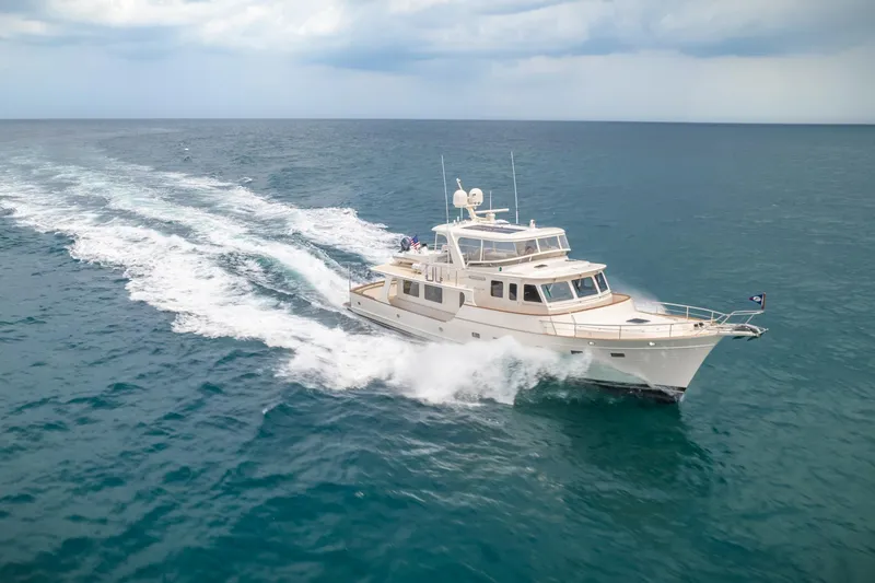 Slide: The Image of Luxury Fleming 65 yacht cruising on open sea, 2027 model. - 6