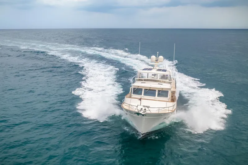 Slide: The Image of Luxury Fleming 65 yacht cruising on open sea, 2027 model. - 8