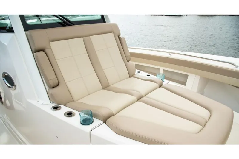 Slide: The Image of Luxurious seating on the 2023 Sailfish 360 CC boat with ocean view. - 14