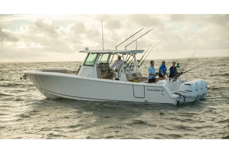 Slide: The Image of 2023 Sailfish 360 CC boat on the water with people fishing. - 5