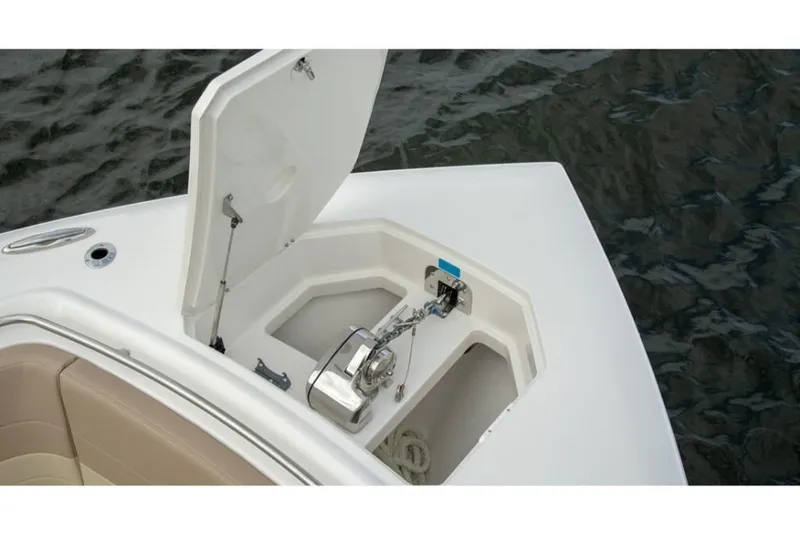 Slide: The Image of 2023 Sailfish 360 CC boat anchor compartment with open hatch. - 9