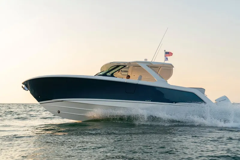 Slide: The Image of 2025 Tiara Sport 38 LS boat cruising on the water. - 1