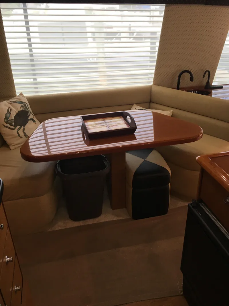 Slide: The Image of Interior dining area of a 2001 Ocean Yachts 56 Super Sport. - 16