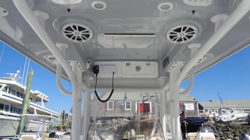 Slide: The Image of 2018 Sportsman 242 Open boat interior with speakers and storage compartments. - 4