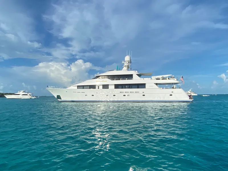 Slide: The Image of 2006 Westport Tri-Deck Motoryacht on blue ocean waters. - 0