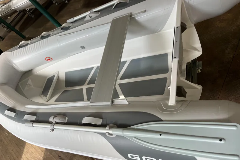 Slide: The Image of 2023 Gala A300 Ultra Lite inflatable boat with oars and seating. - 7