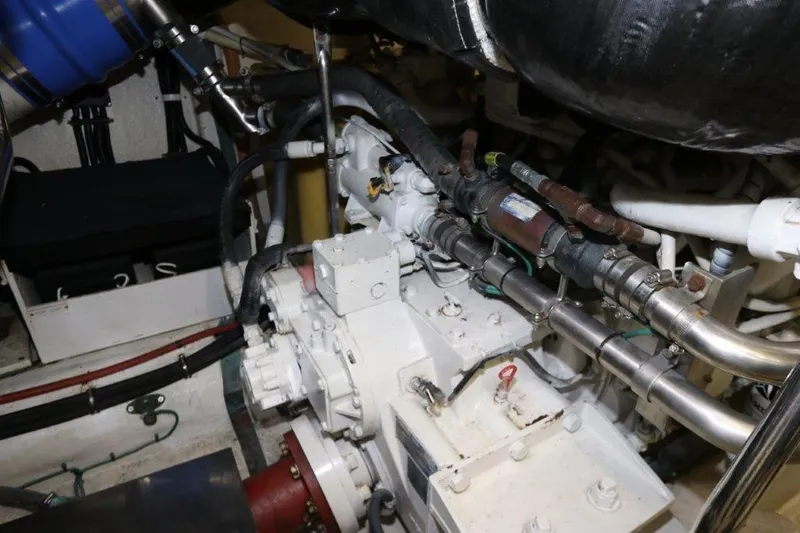 Slide: The Image of Engine room of a 2004 Riviera 58 Enclosed Flybridge yacht. - 29