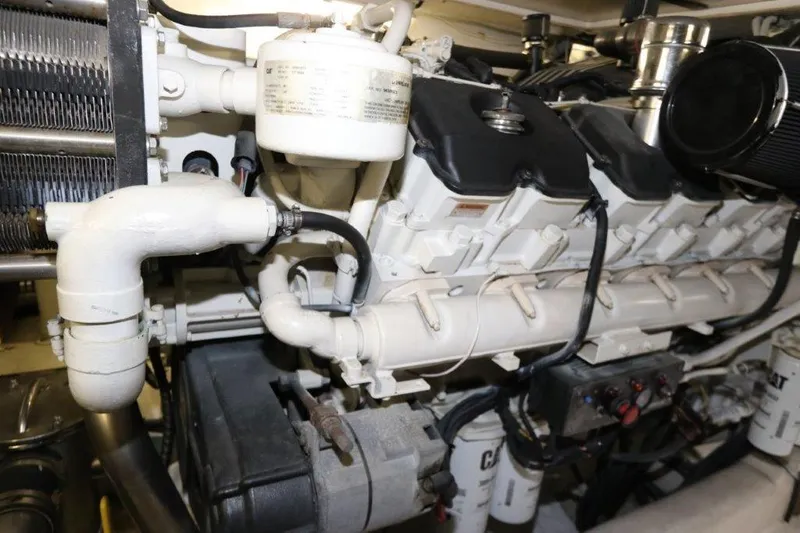 Slide: The Image of Engine room of a 2004 Riviera 58 Enclosed Flybridge yacht. - 33