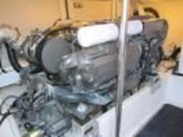 Slide: The Image of 2008 Luhrs 35C engine compartment with visible engine components. - 30