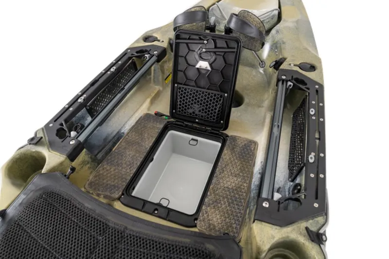 Slide: The Image of 2023 Hobie Outback kayak with open storage compartment. - 27