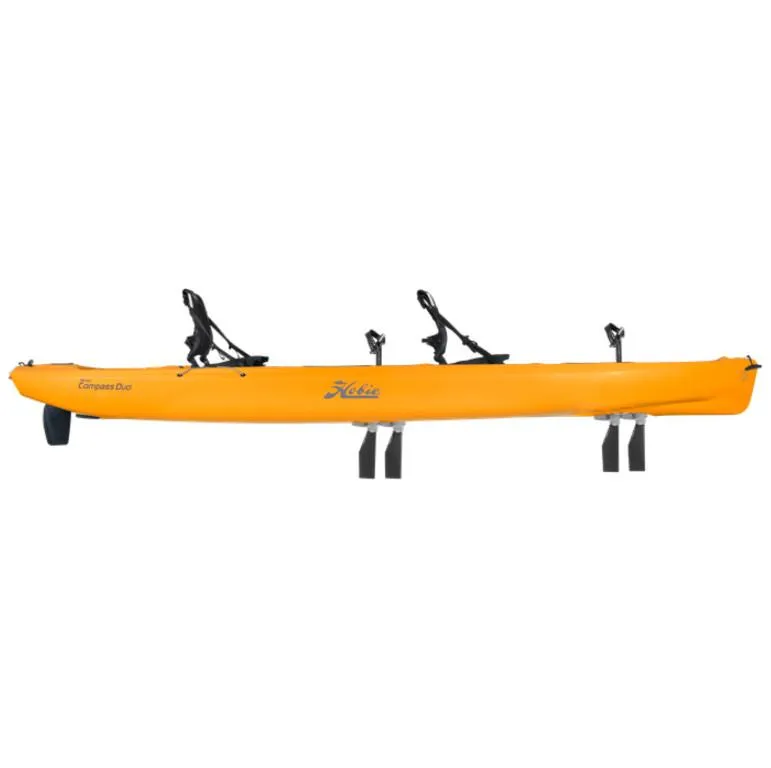 Slide: The Image of 2023 Hobie Compass Duo kayak, bright yellow, side view with two seats and pedal drives. - 6