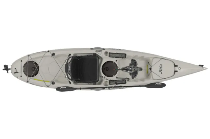 Slide: The Image of 2023 Hobie Revolution 11 kayak, top view, beige color, with paddle and pedal drive system. - 15