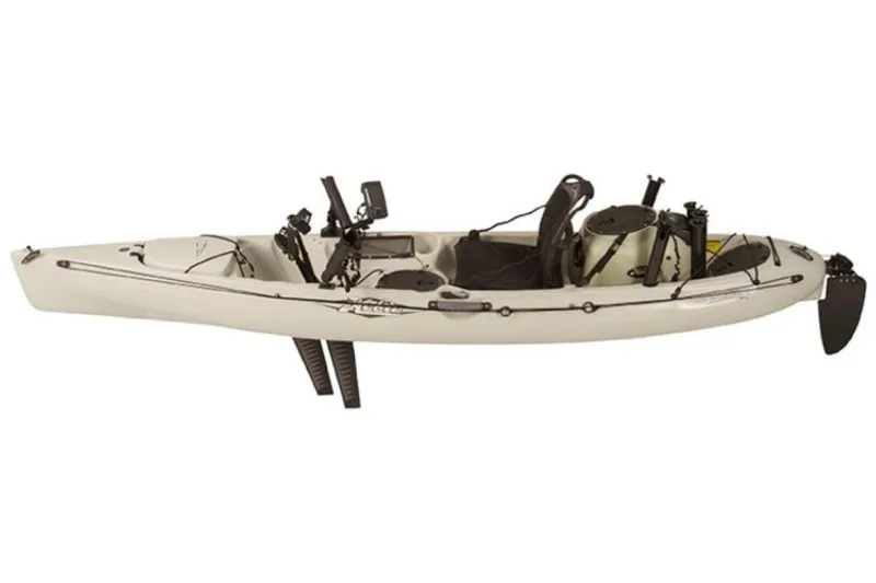 Slide: The Image of 2023 Hobie Revolution 11 kayak, side view, beige color, equipped with pedal drive system. - 16