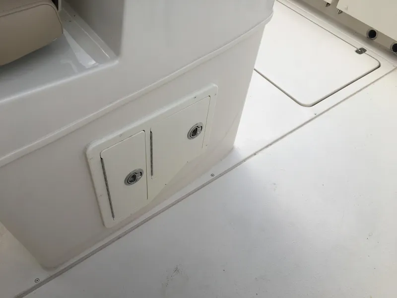 Slide: The Image of 2026 Sea Chaser 35 HFC boat interior with storage compartments and seating. - 21