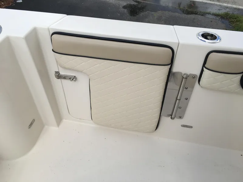 Slide: The Image of 2026 Sea Chaser 35 HFC boat interior with quilted upholstery and stainless steel hardware. - 26