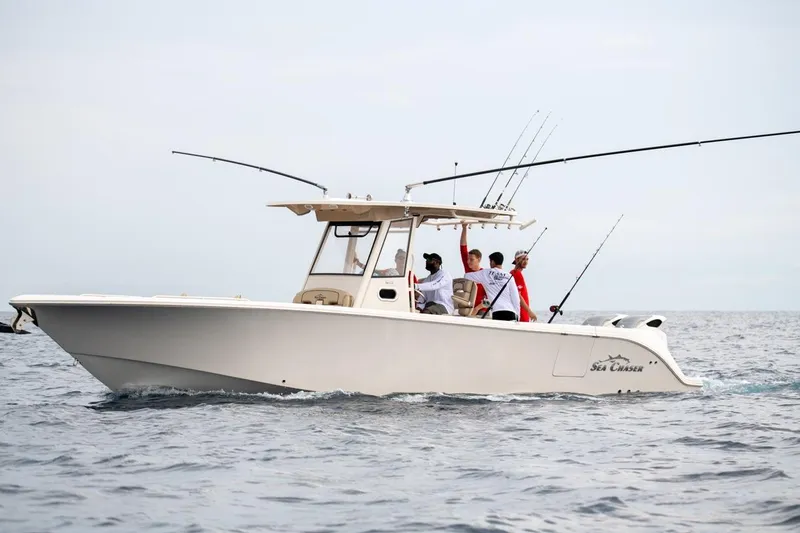 Slide: The Image of 2026 Sea Chaser 35 HFC boat with anglers fishing in open water. - 37