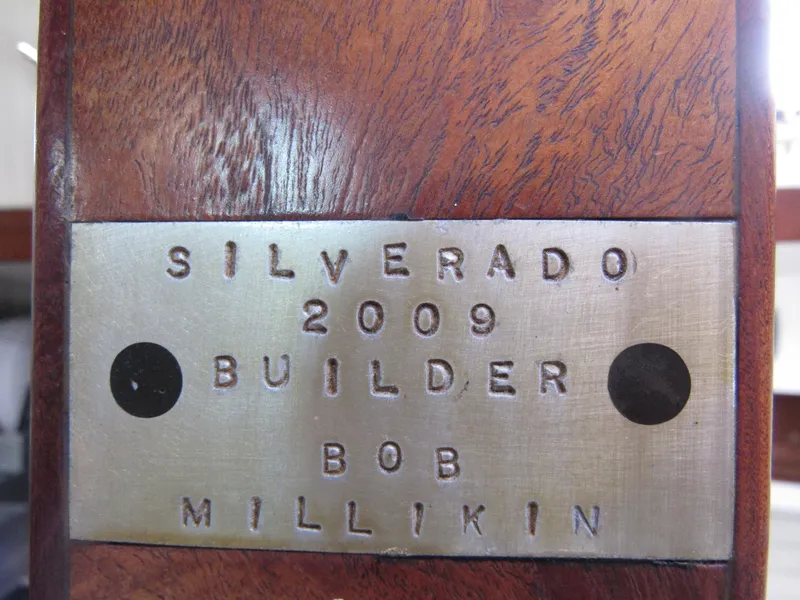 Slide: The Image of Plaque on 2009 Custom Pilothouse Cutter, builder Bob Millikin, labeled "Silverado." - 34