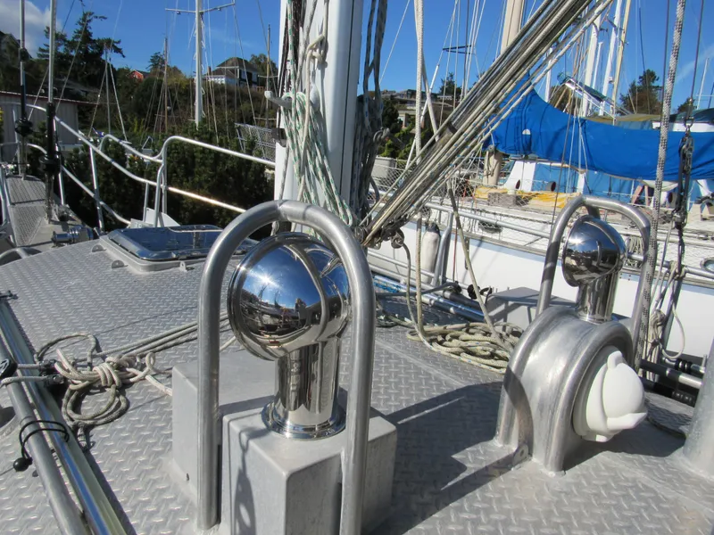Slide: The Image of Deck of 2009 Custom Pilothouse Cutter with rigging and polished metal fittings. - 4