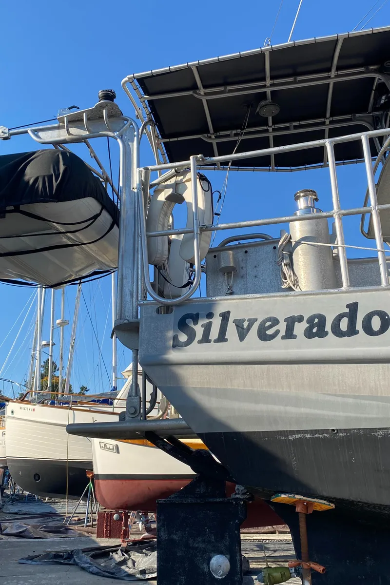 Slide: The Image of Custom 2009 Pilothouse Cutter "Silverado" docked, featuring a sleek design and modern equipment. - 45