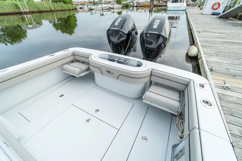 Slide: The Image of 2025 Valhalla Boatworks V-33 with twin outboard engines docked. - 10