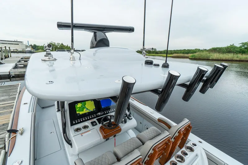 Slide: The Image of 2025 Valhalla Boatworks V-33 center console with advanced navigation system. - 14