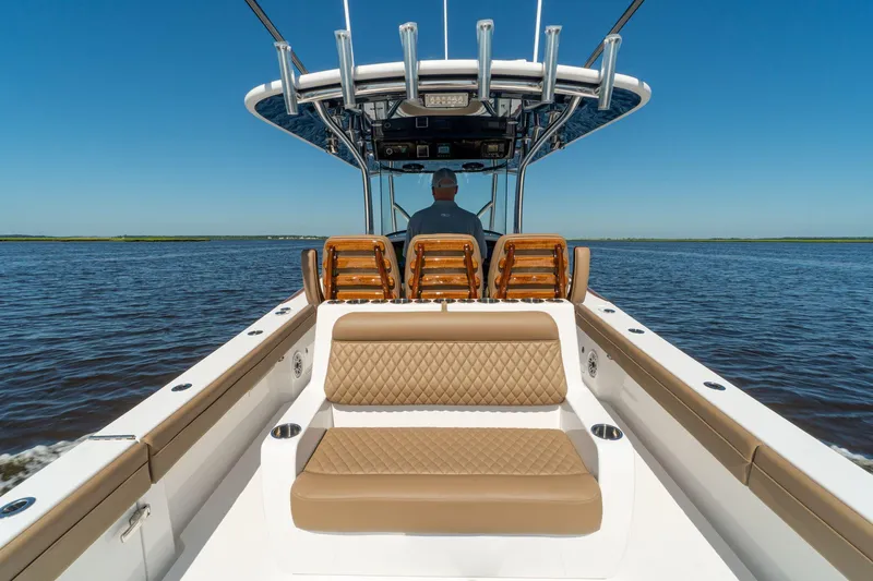 Slide: The Image of 2025 Valhalla Boatworks V-37 on open water, featuring luxurious seating. - 9