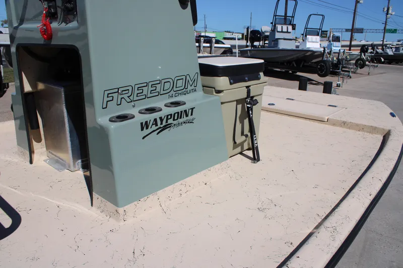Slide: The Image of Boat deck featuring Freedom 14 Chiquita model, 2026, with Waypoint Marine branding. - 11