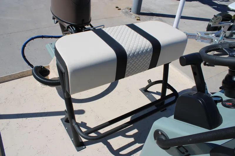 Slide: The Image of Boat seat on a 2026 Freedom 14 CHIQUITA, featuring a quilted design and sturdy frame. - 13