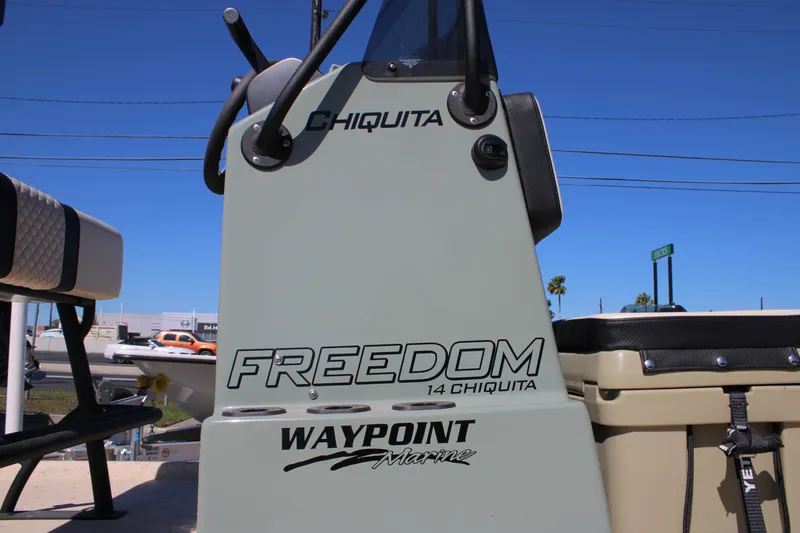 Slide: The Image of 2026 Freedom 14 Chiquita boat console with Waypoint Marine branding. - 17
