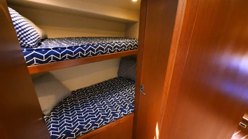 Slide: The Image of Bunk beds in the 2025 Henriques 50 EXHT yacht cabin. - 11