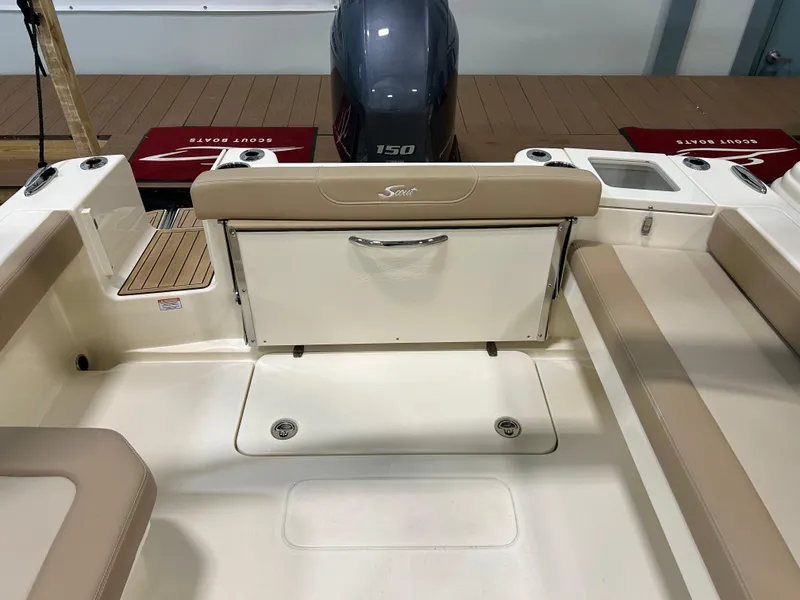 Slide: The Image of 2024 Scout 215 Dorado boat interior with Yamaha 150 outboard motor. - 9