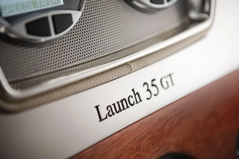 Slide: The Image of Close-up of 2024 Chris-Craft Launch 35 GT dashboard with model name. - 16