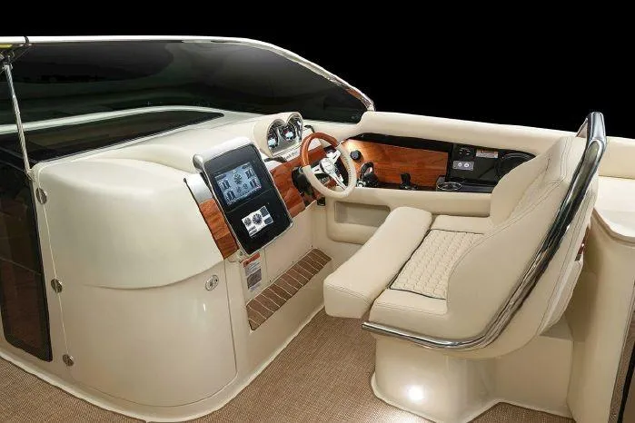 Slide: The Image of Luxurious helm of 2024 Chris-Craft Launch 35 GT with advanced controls and plush seating. - 2